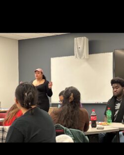 NOBCChE President Jakyra Simpson presenting to students